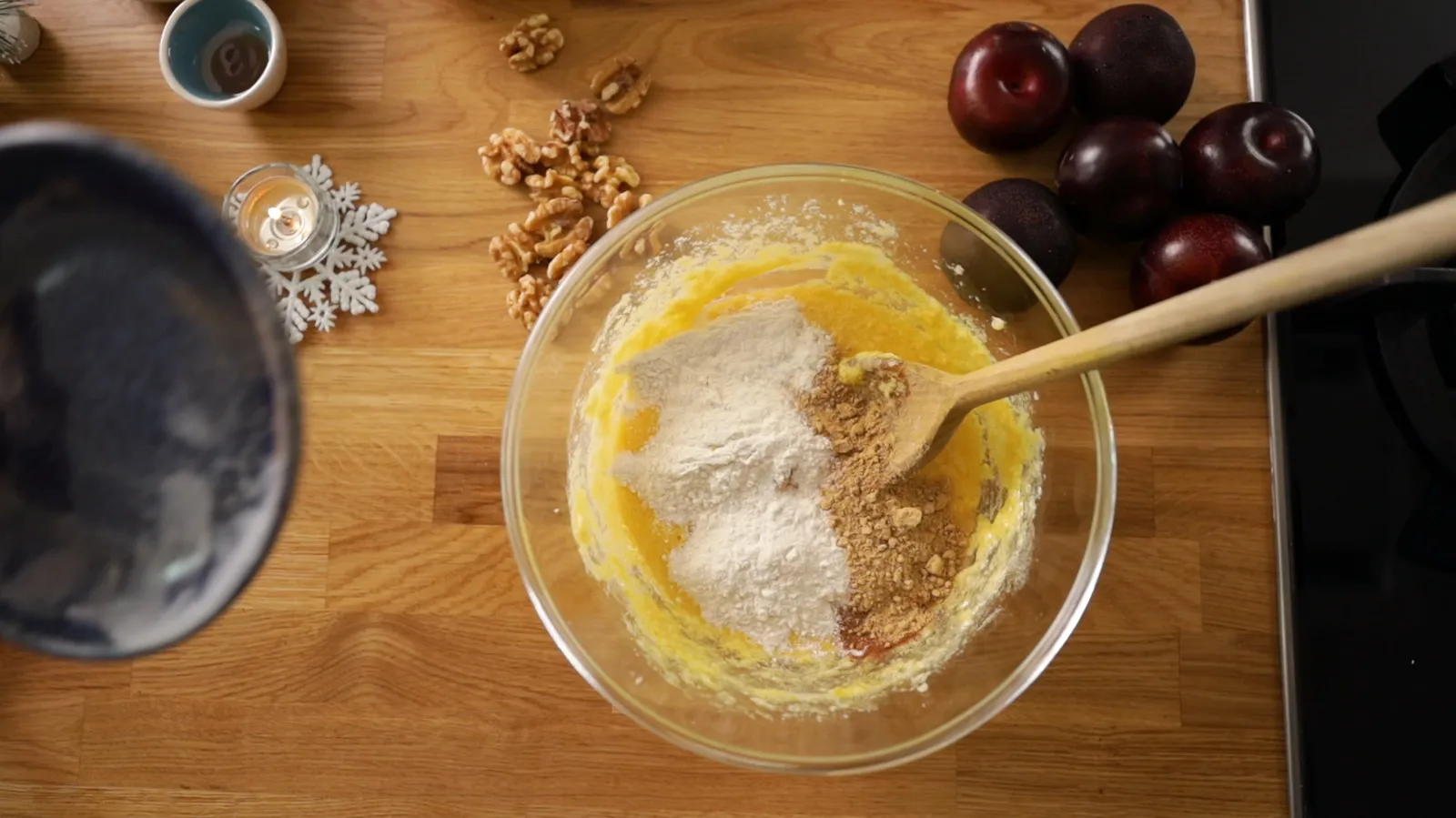 Butter, sugar and spices being added to mixing bowl