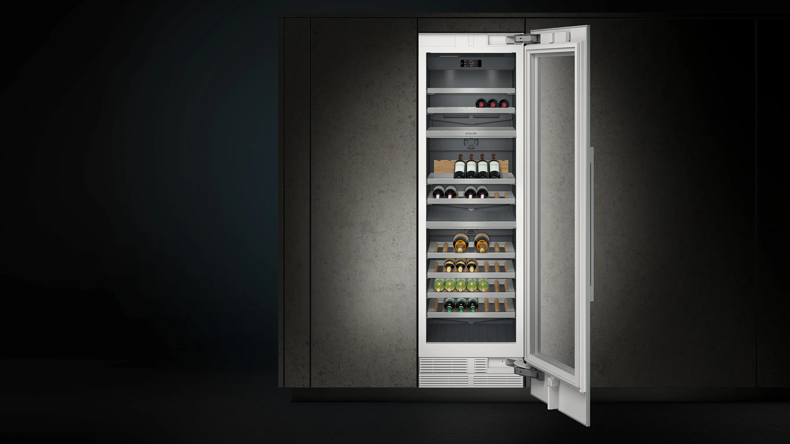 Stocked wine cooler with door open built into kitchen.