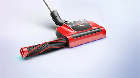 Duză roșie pentru aspirator Bosch cu un design unic al periei, care evidențiază forma sa elegantă și tehnologia modernă