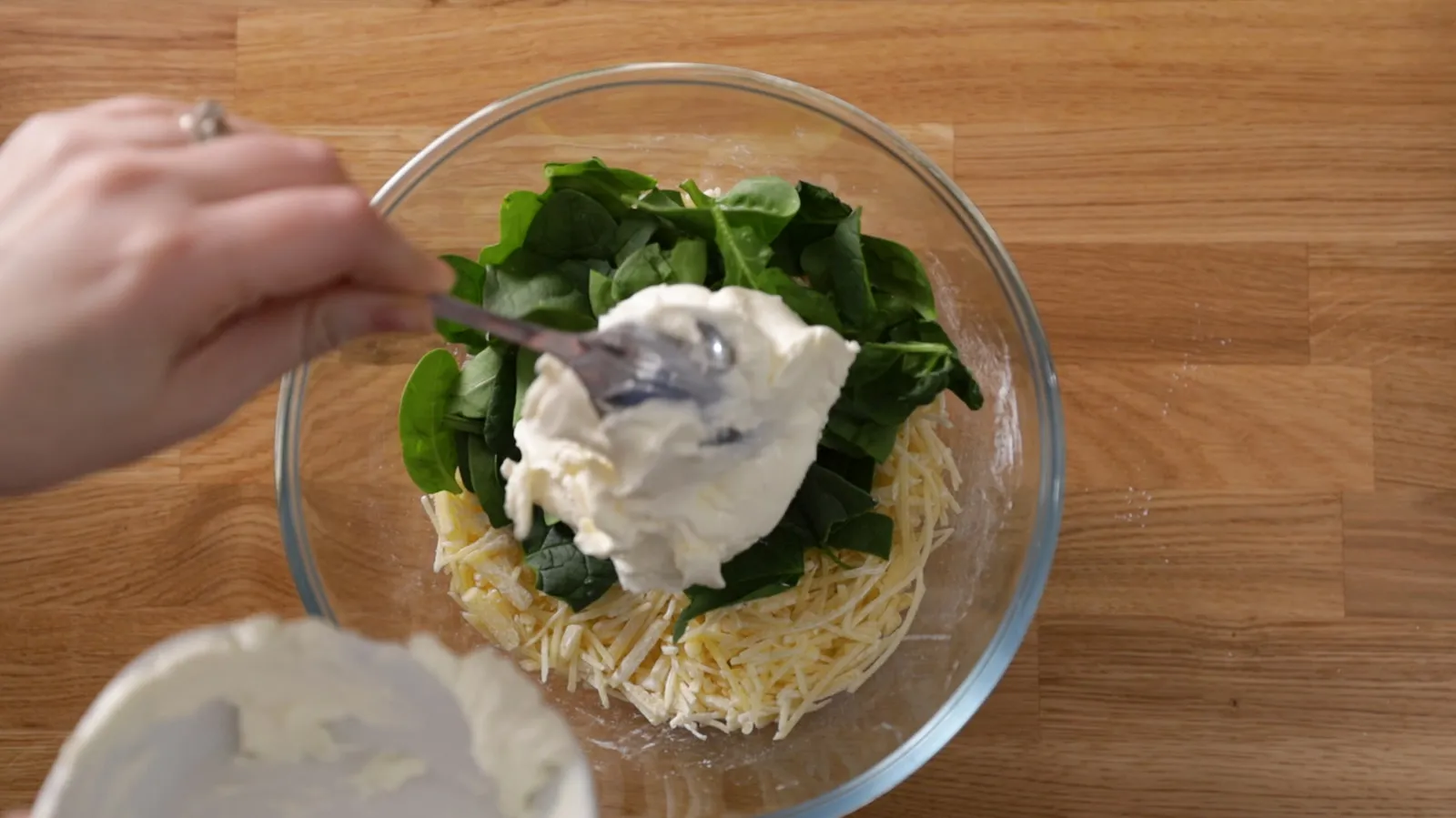 mixing wet ingredients into the bowl