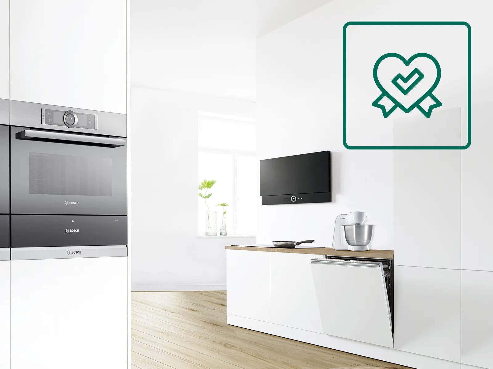 Modern kitchen with appliances, TV, and minimalist furniture in a bright, open space.