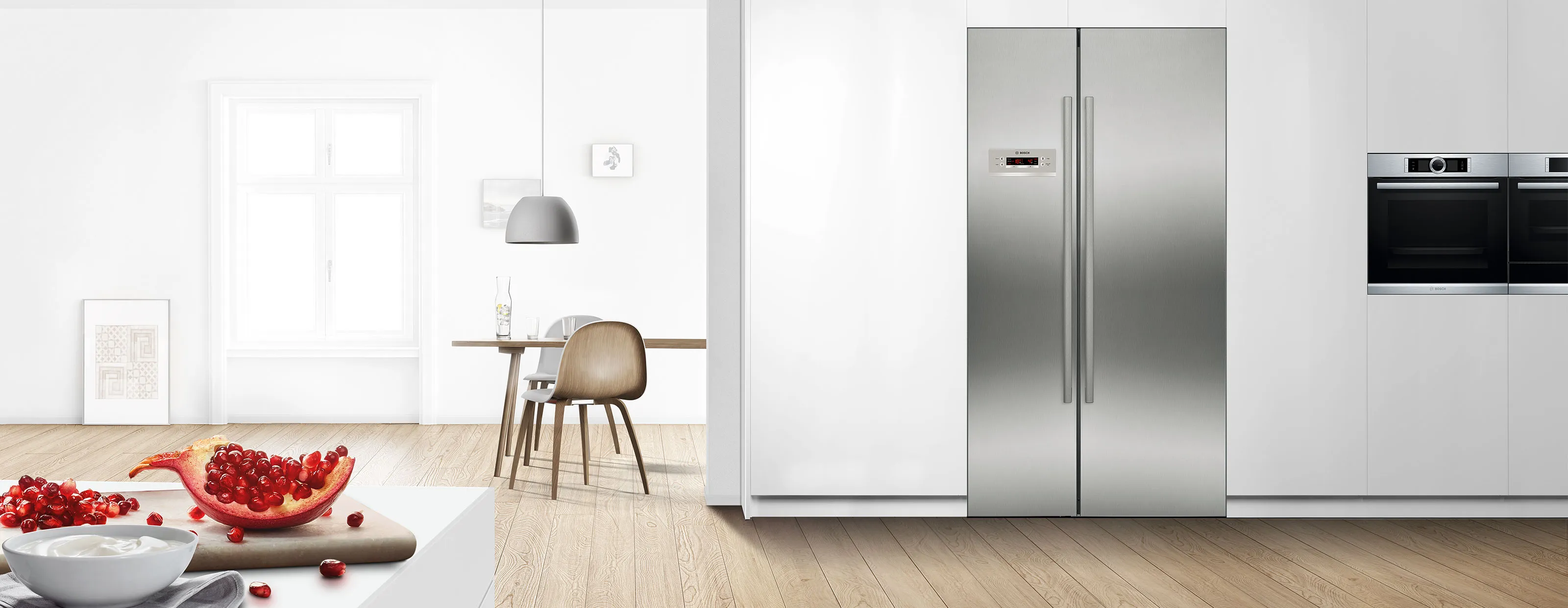 Open freestanding freezer in a bright, modern kitchen.