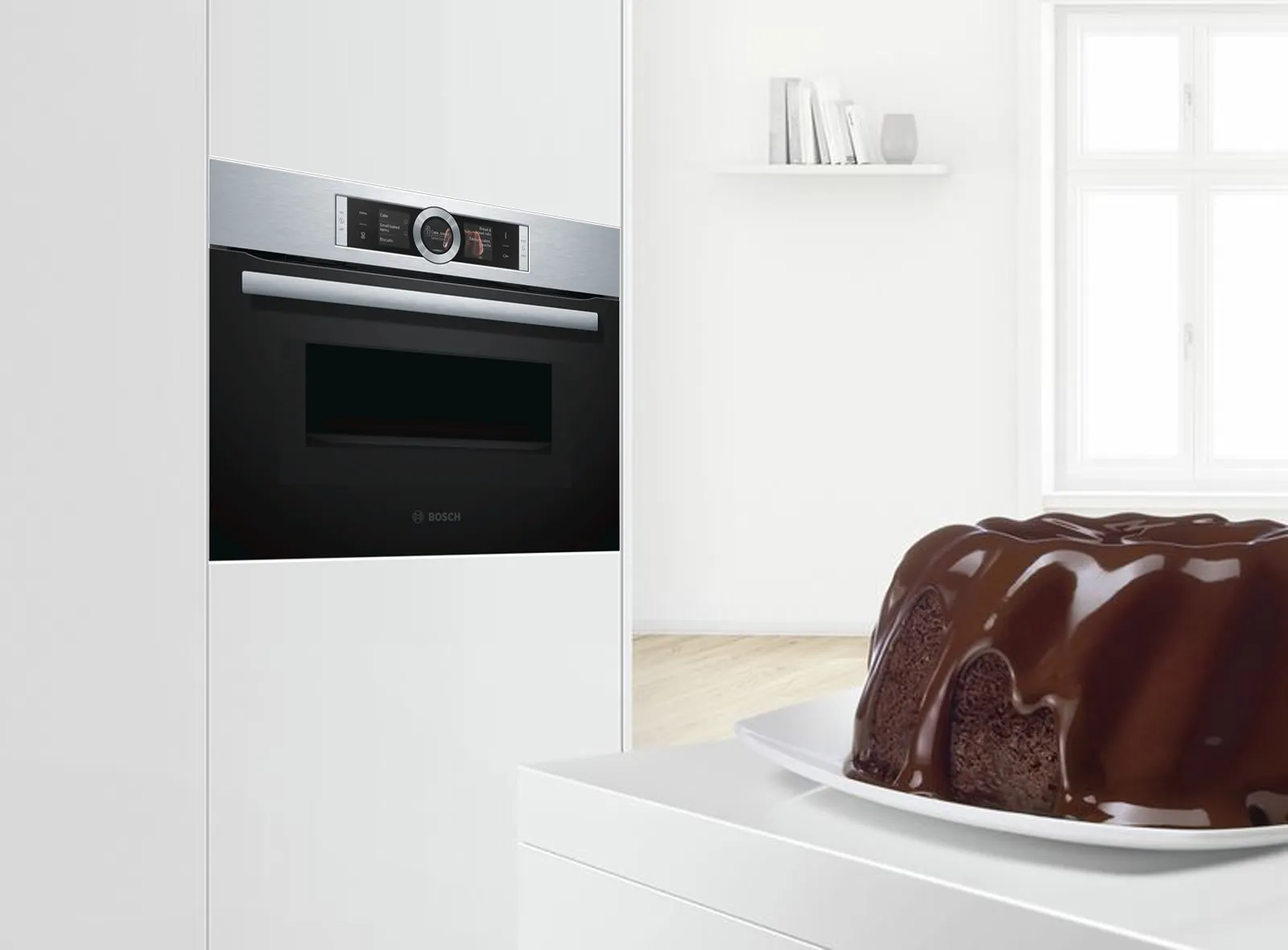 Microwave oven on wooden kitchen counter, modern black appliance with digital display.