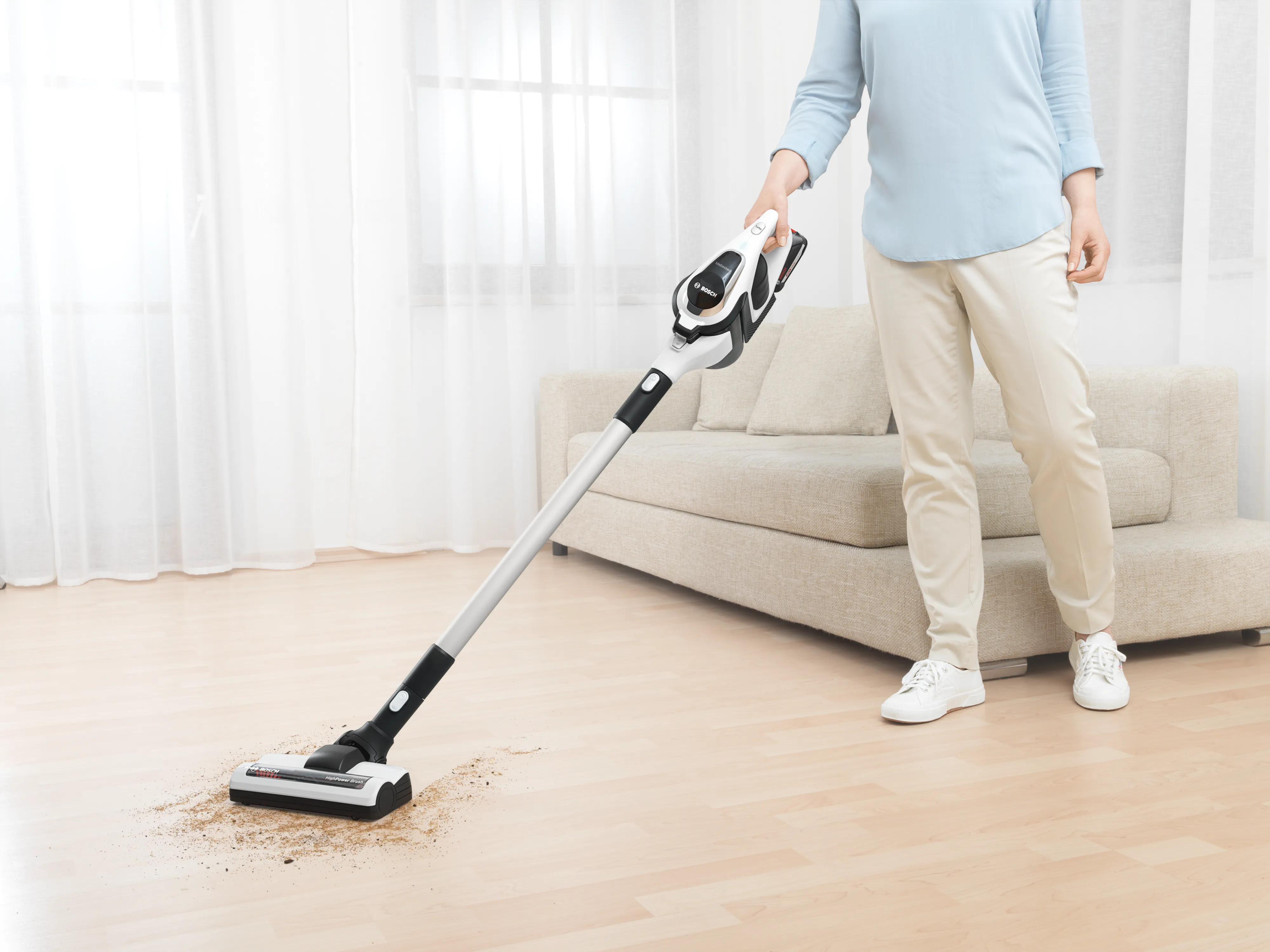 Person using Unlimited Vacuum on hard floor