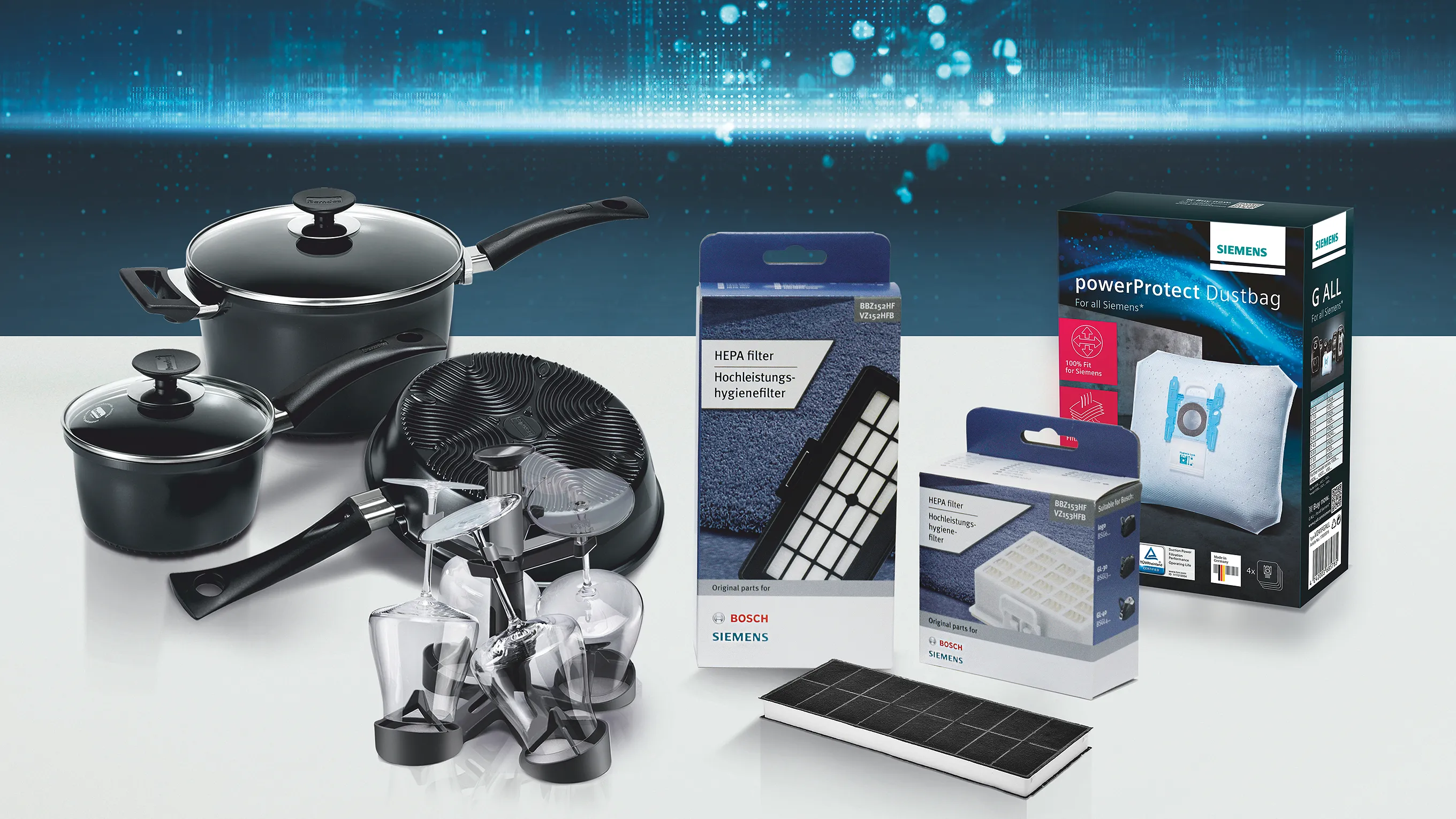 Man in a grey uniform and blue trousers, carrying a tool bag, entering a bright room while a woman, seen from behind, greets him.