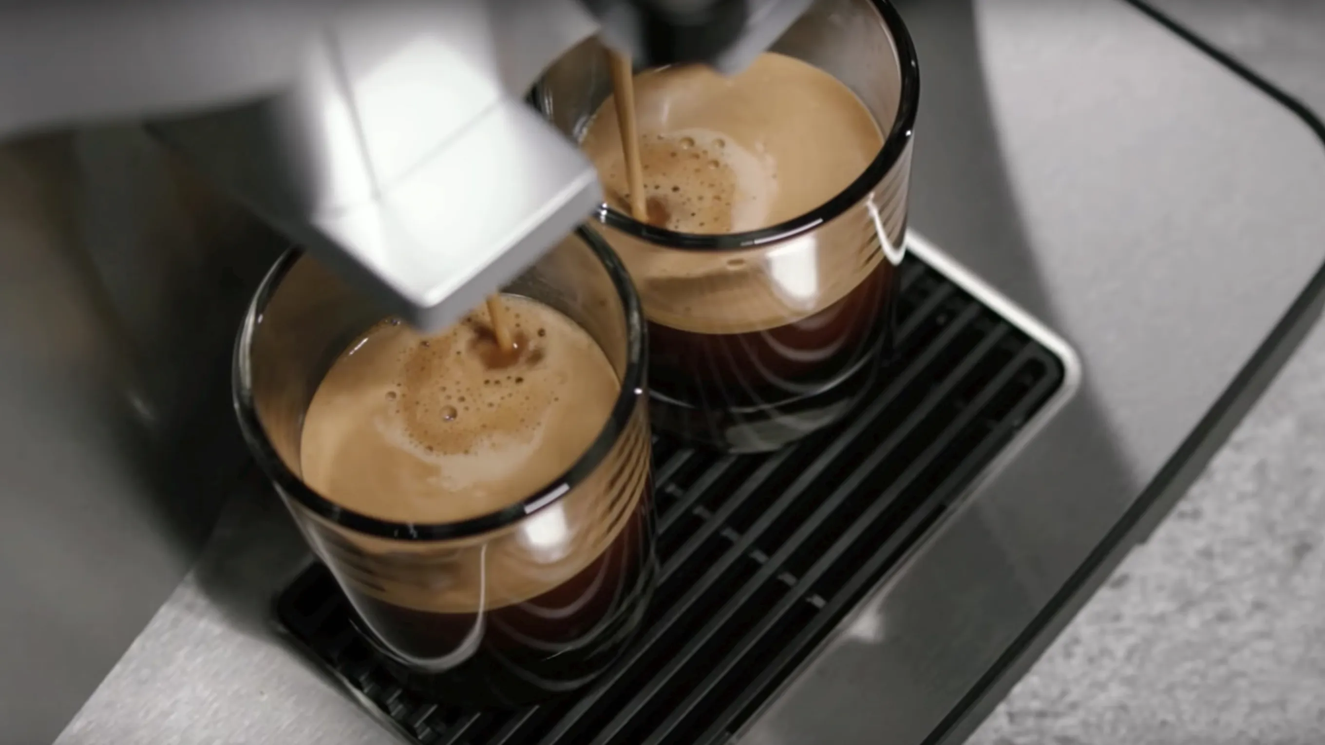 coffee brewing with two cups
