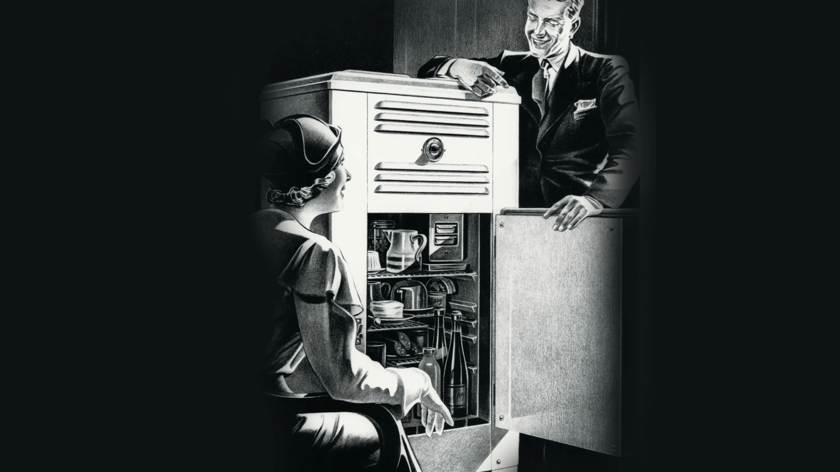 Businessman operating early computer, black and white photo.