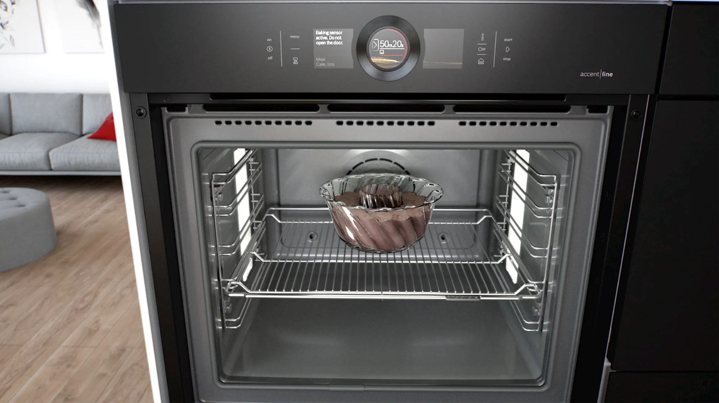 Oven inredning med bakrätt som innehåller mat, köksapparat med kontrollpanel.