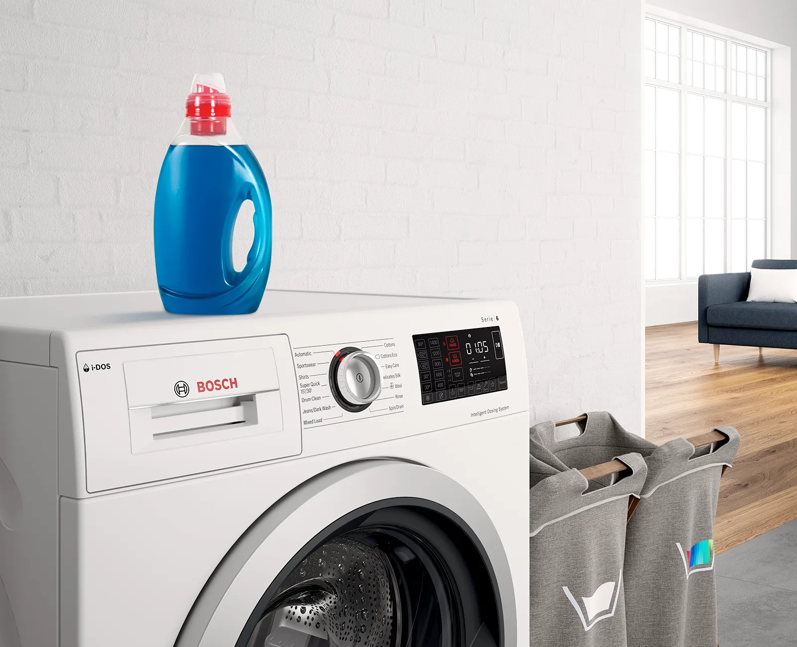 White Bosch washing machine with a blue detergent bottle on top, next to a laundry hamper.
