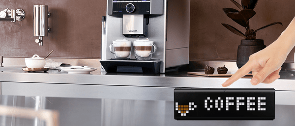Image shows how LaMetric watch informs that coffee is ready