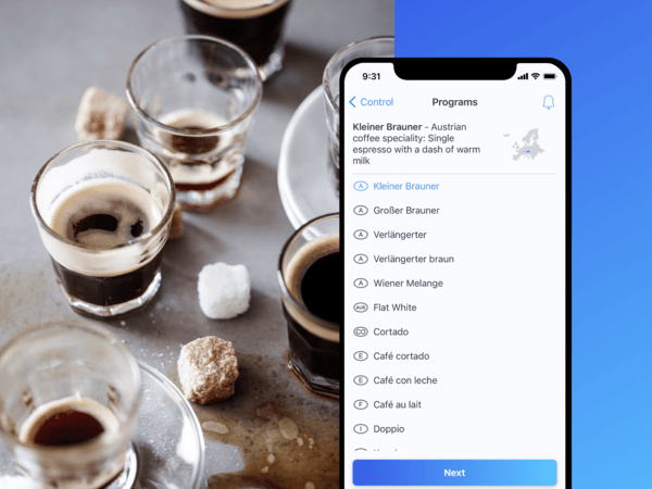 Cups of coffee and phone on Home Connect app