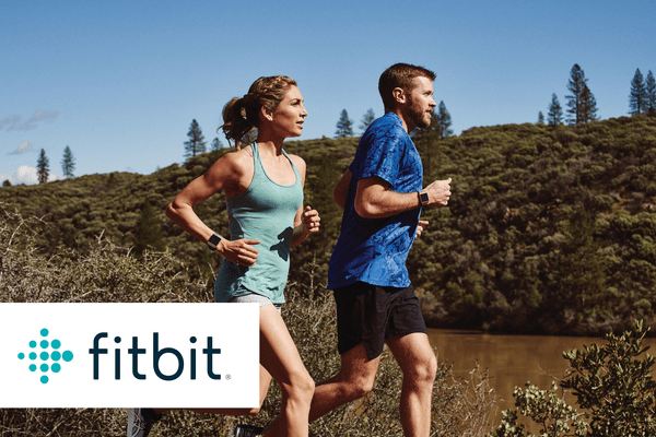 Two runners on a job with their fitbits