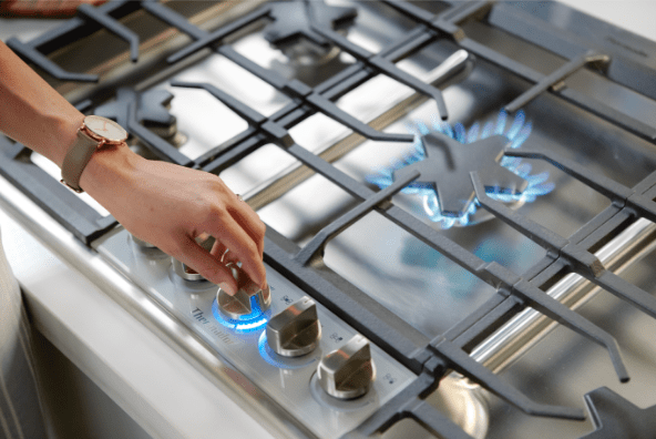 Hand adjusting knob on thermador gas cooktop