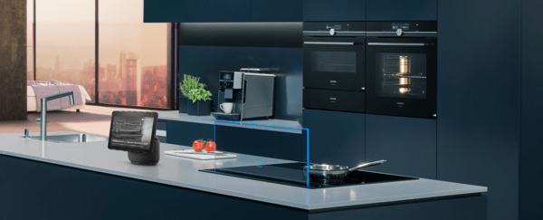 Kitchen with Siemens appliances, Amazon Echo Show placed on the kitchen counter in front