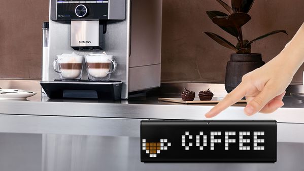 Image shows how LaMetric watch informs that coffee is ready