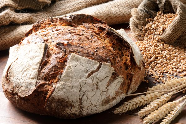 Two hands with homemade bread