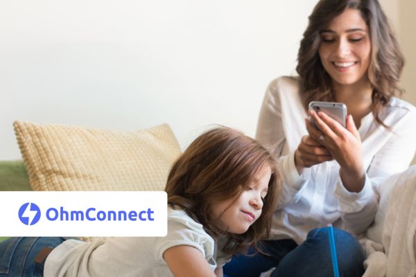 Mother and daughter and OhmConnect logo