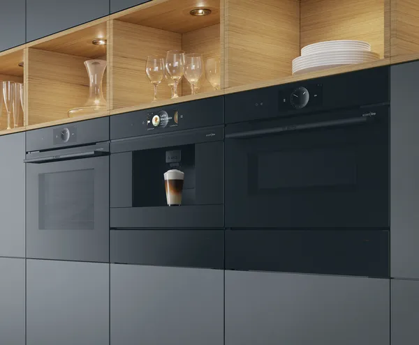 Bosch accent line készülékek: beépíthető sütő, kávéfőző és kombinált sütő modern fekete konyhabútorban