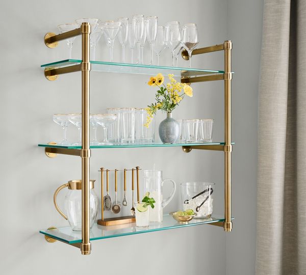 Brass and glass wall-mounted shelf