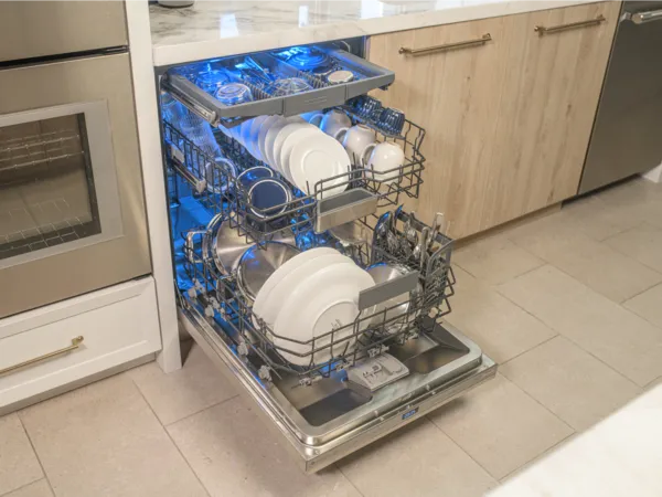 Thermador stainless steel dishwasher open fully loaded