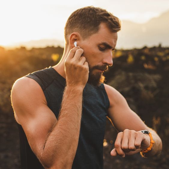 Man looking at his smartwatch