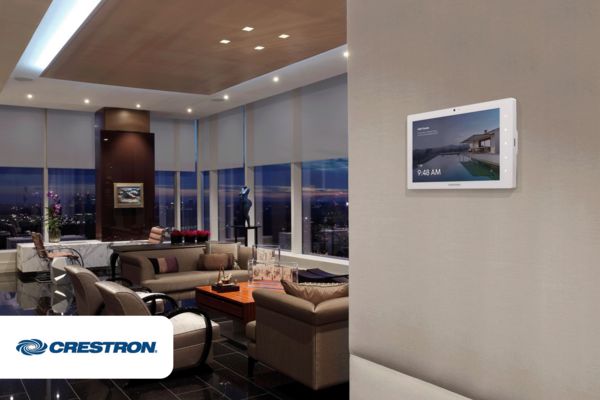 Crestron Smart Home panel fixed to a wall, living room with a view in the background