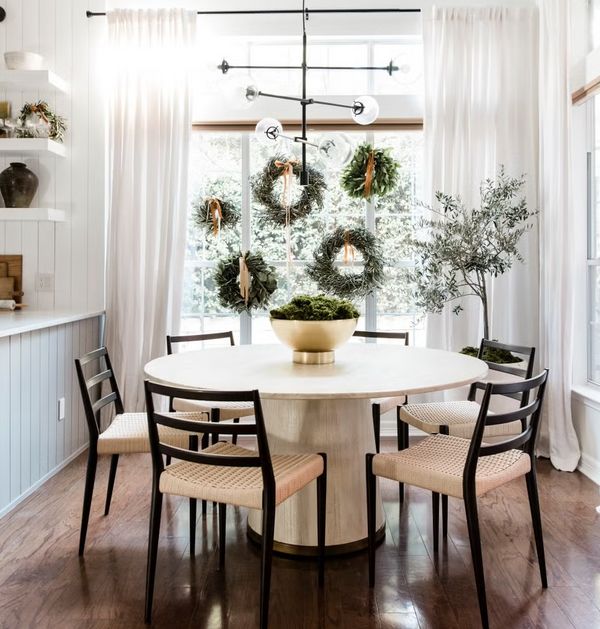 Multiple wreaths in dining window