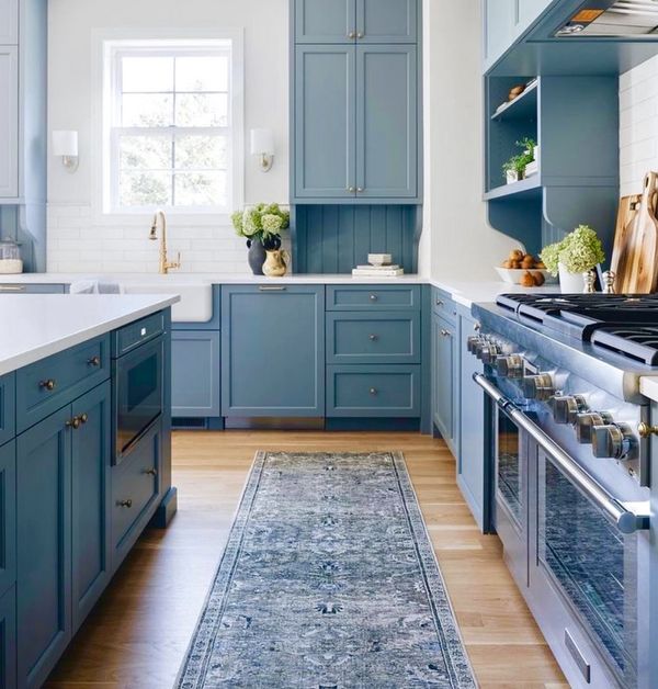 Blue kitchen with 60” range