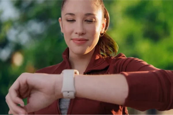 woman looking at watch