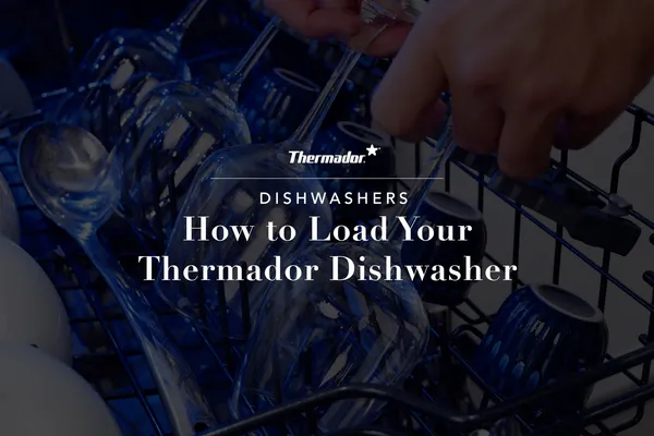 Load dishwasher