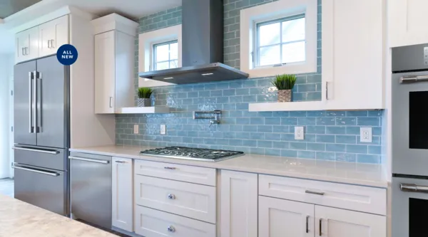 26075860_thermador-luxury-kitchen-appliance-packages-gas-cooktop-white-blue-subway-tile-kitchen_2640x1465.webp