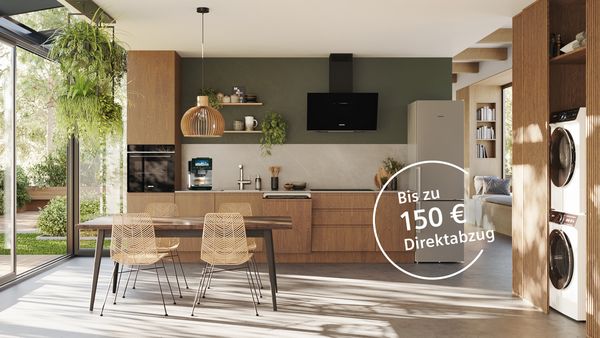 Grüner Raum mit vielen Pflanzen und Siemens Hausgeräten und dem Hinweis auf die aktuelle Aktion mit bis zu 150 € Direktabzug im Siemens Online Shop 
