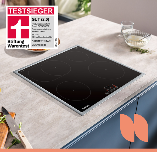 Ein Constructa Induktionskochfeld auf einer hellen Arbeitsplatte mit einem Testsieger Logo.