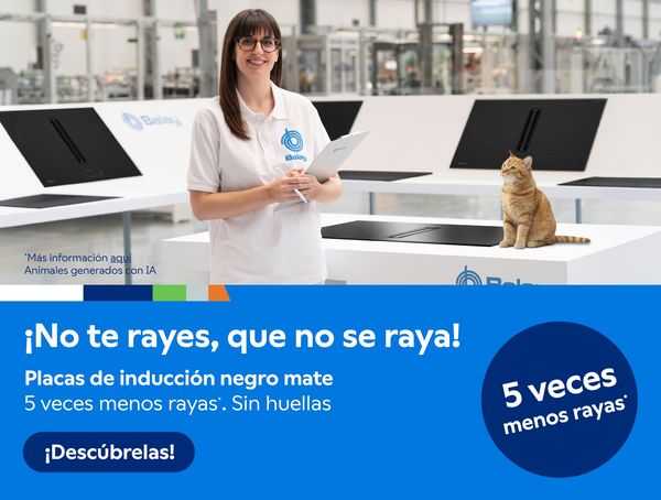 Imagen de empleada de Balay en ambiente de laboratorio, al lado de una encimera con un gato al lado de una placa, acompa&ntilde;ado del texto "No te rayes, que no se raya. Placas de inducci&oacute;n negro mate, 5 veces menos rayas, sin huellas", y un bot&oacute;n con el texto "&iexcl;Desc&uacute;brelas!"
