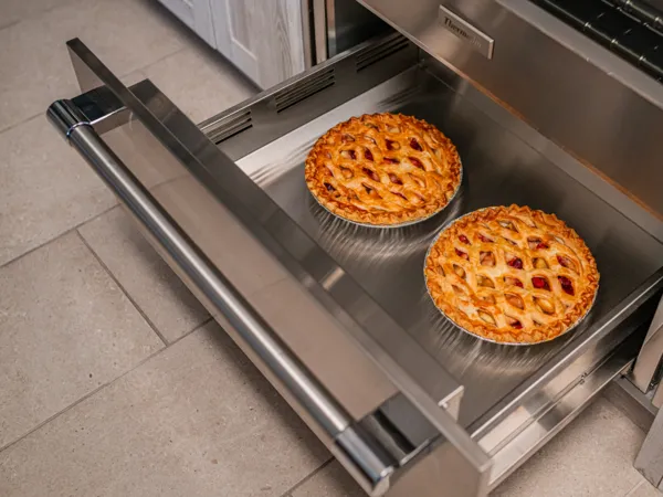 thermador triple ovens closeup professional warming drawer with pastries
