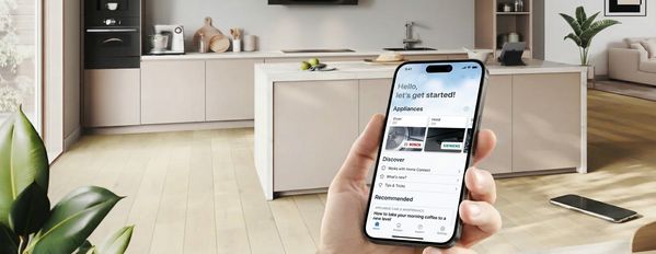 Several smartphones with images of the Home Connect app
