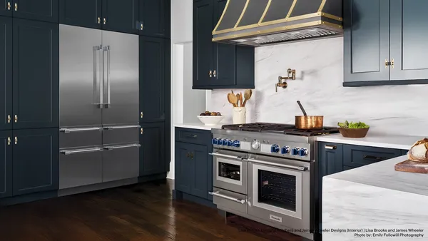 Navy blue gold accent kitchen range