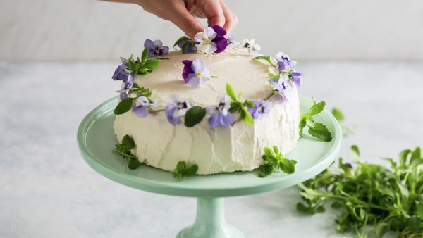 Edible flower cake with sweet geranium, blackcurrant & vanilla