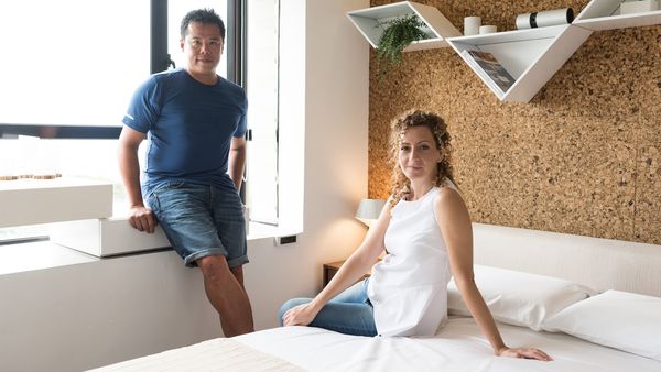 kevin chu and wife in bedroom
