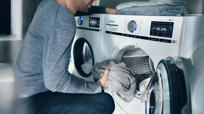 Las lavadoras viven más tiempo con calgon fotografías e imágenes