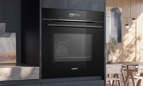 Close up of black Siemens oven in kitchen unit