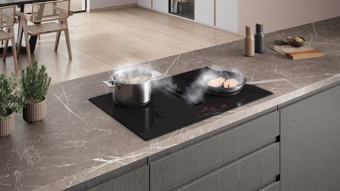 Induction Air Hob in Kitchen Island with cooking prawns