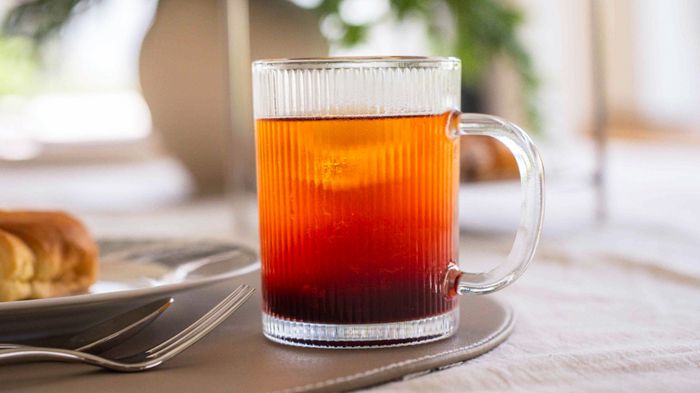 Drink in glass mug on table