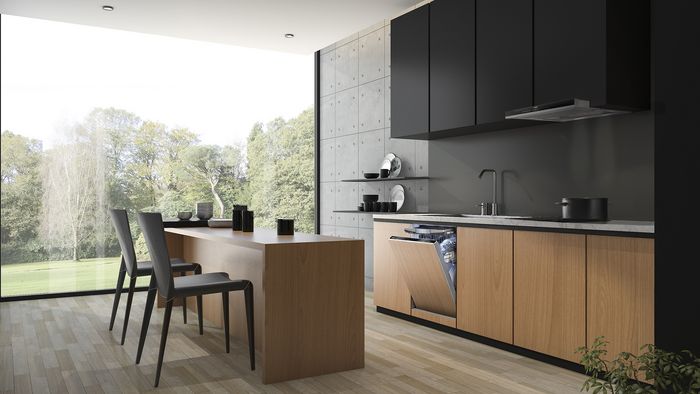 תכנון מטבח של אי פתוח בלבן, הממוקם בחלל מגורים גדול.   