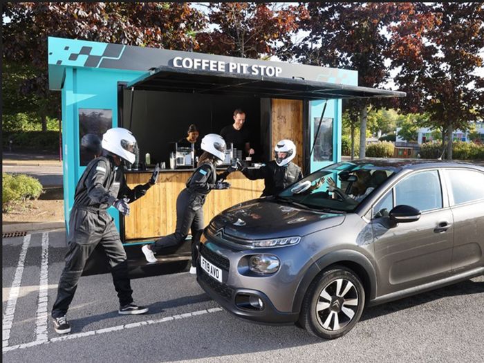 Car stopping at Siemens coffee pit stop