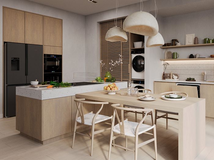 Modern kitchen featuring wooden cabinetry, a spacious island with fruit, and stylish pendant lights, creating a warm and inviting atmosphere.