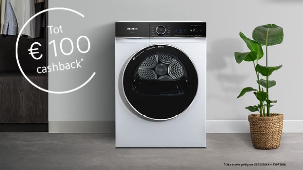 Siemens droogkast in een moderne wasruimte met een cashbackactie tot &euro;100. Naast het toestel staat een groene kamerplant in een gevlochten mand.