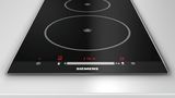 iQ100 Domino touchSlider induction hob EH375ME11E black glass with stainless steel trim EH375ME11E EH375ME11E-2