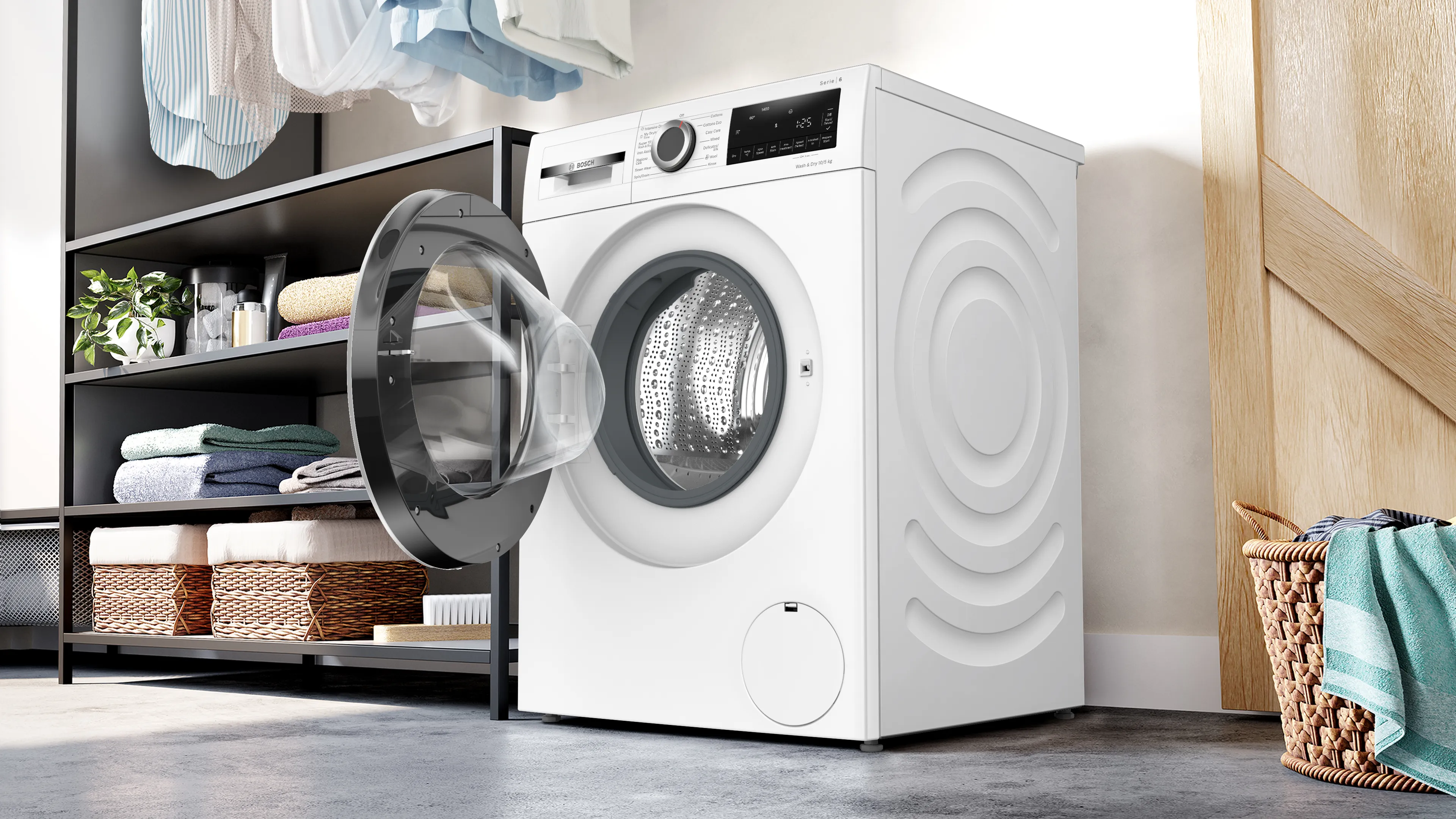 Folded same colour towels as the energy label stacked on top of a washer dryer.