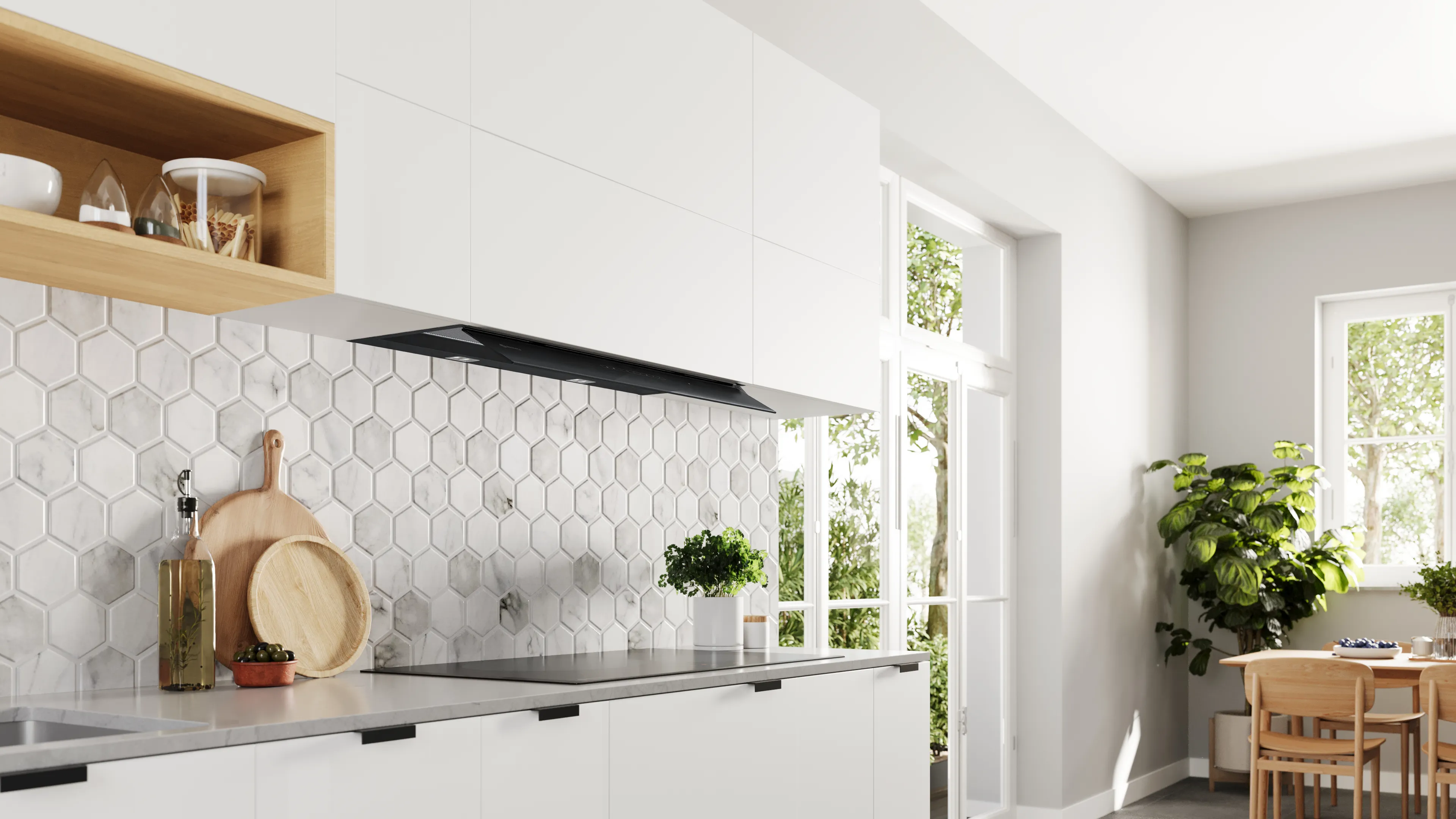 Campana extractora negra integrada dentro de un mueble blanco